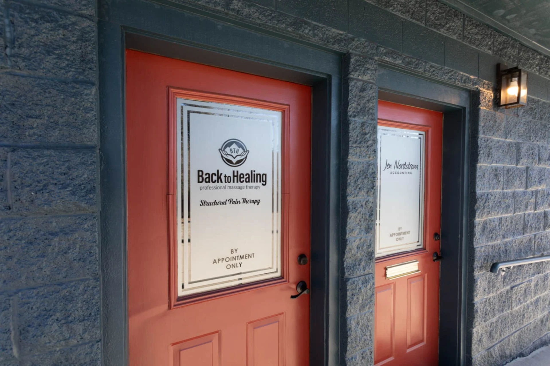 front door of back to healing massage